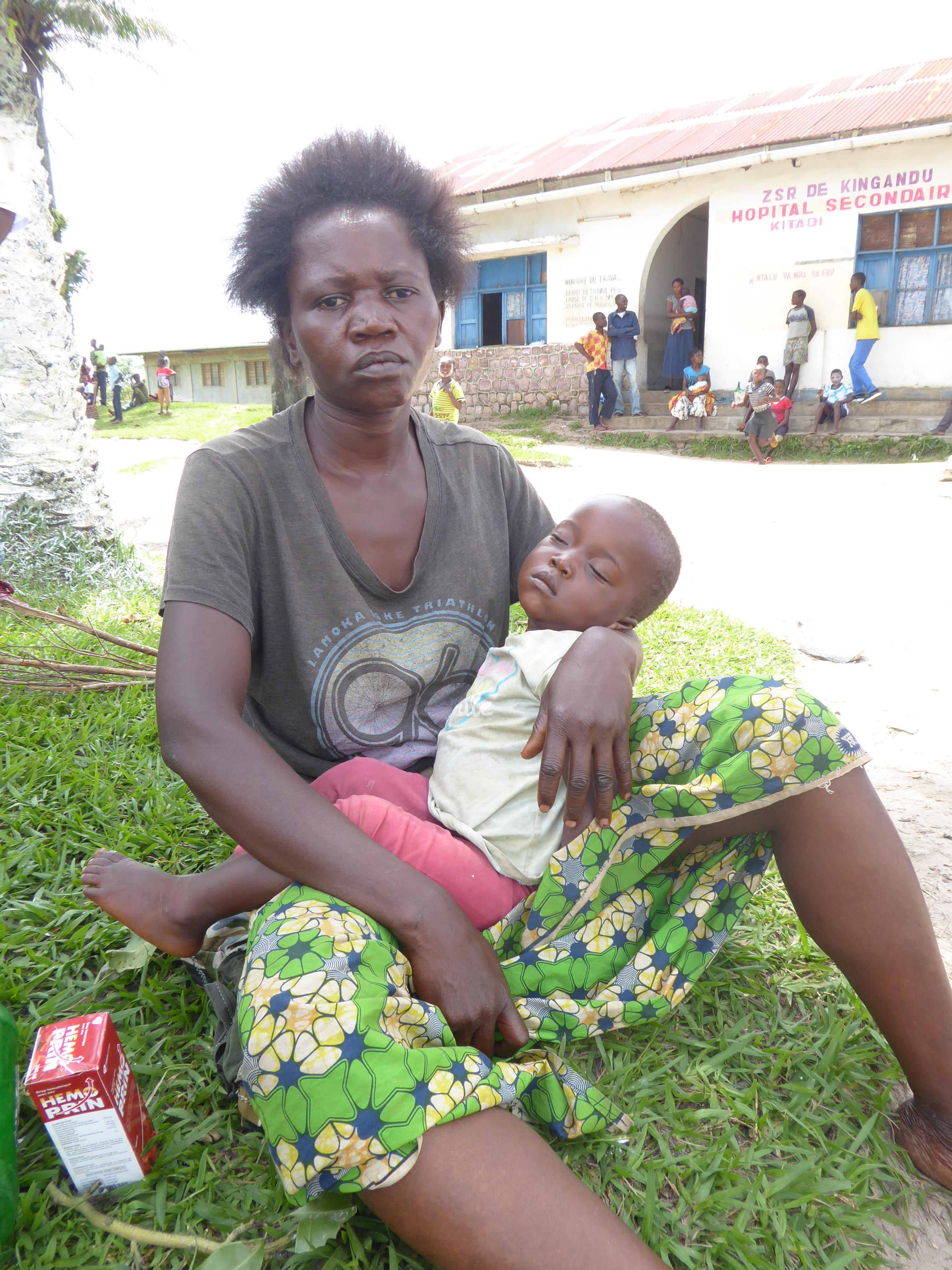 Annette Kenzi with son at Kigandu health center